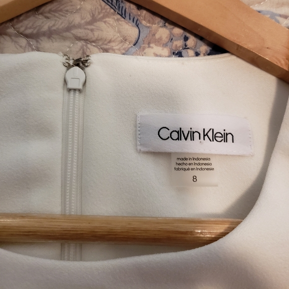 Solid Sleeveless Cascading Ruffle Dress - Picture 6 of 10